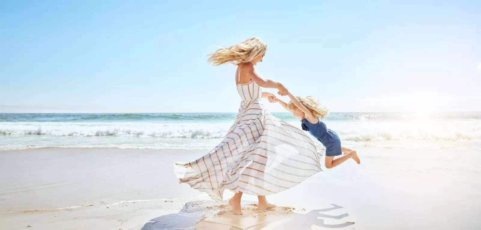 mother and daughter on beach