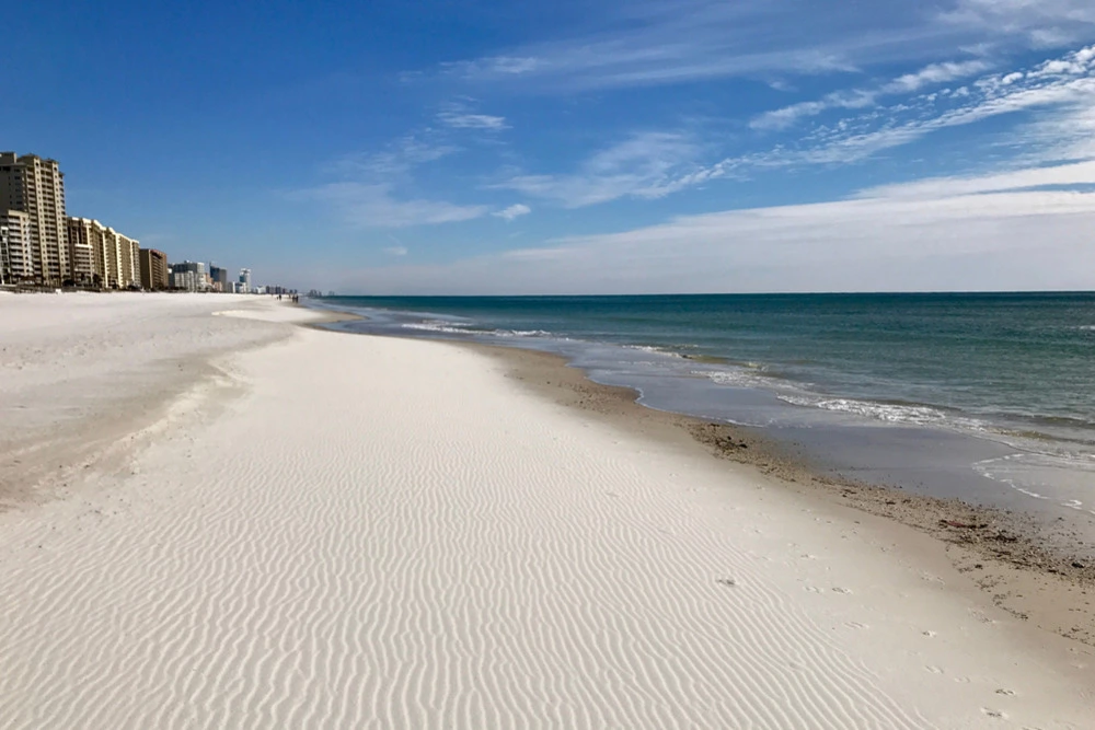 empty Orange Beach shore in winter