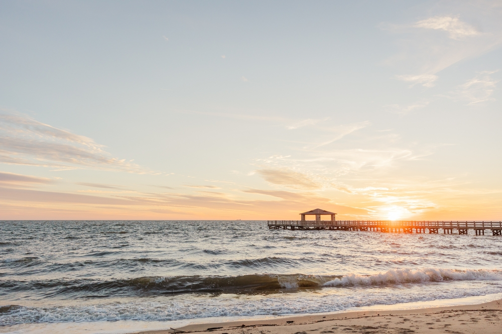 Gulf Shores sunset behind pier