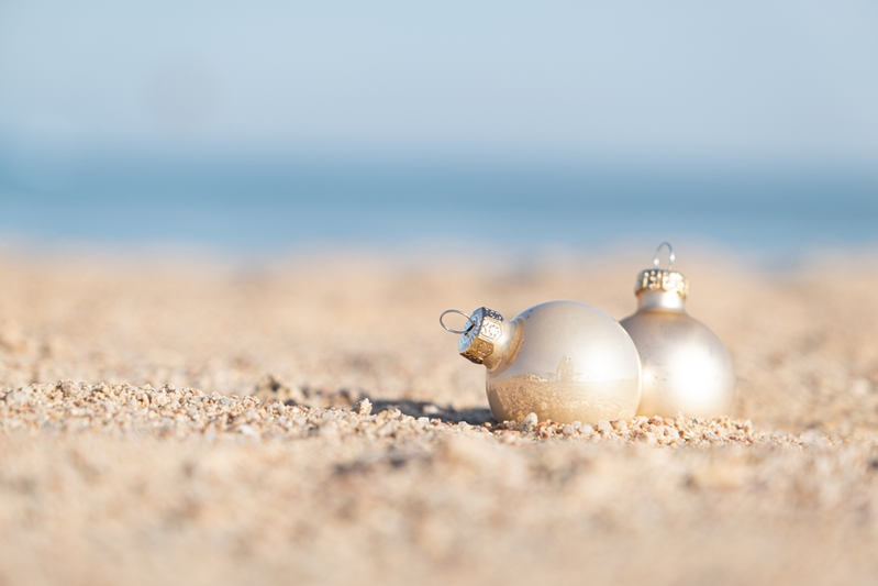 Christmas ornaments in the sand
