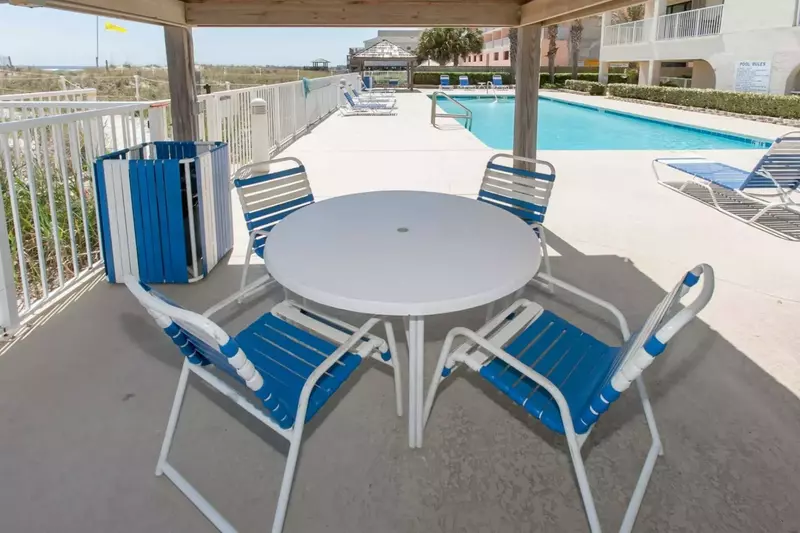 Covered picnic area by the outdoor pool.