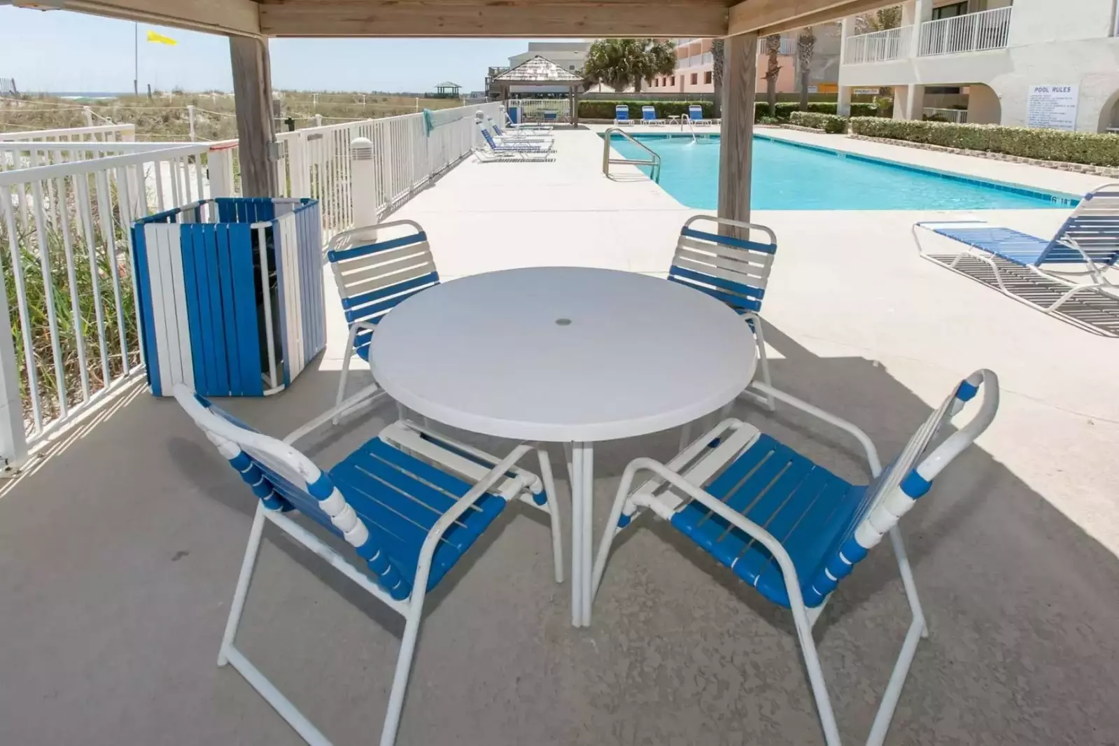 Covered picnic area by the outdoor pool.