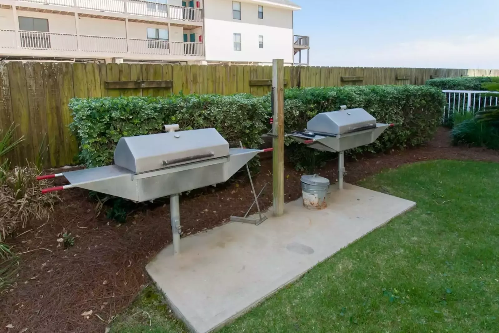 Community charcoal grill area at Casa Del Sol condominiums.
