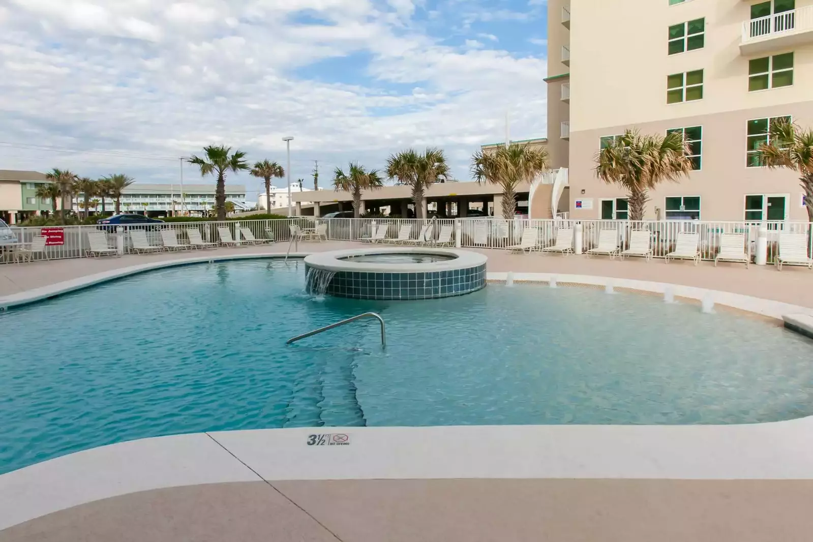 Tropical foliage at the community pool and hot tub area
