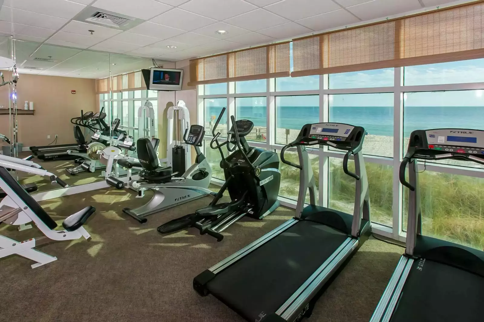 Cardio machines overlooking the beach and the Gulf