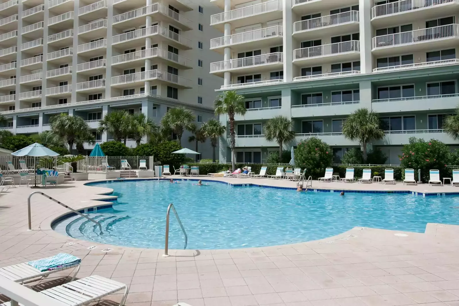 Large in-ground pool at Beach Club condominiums