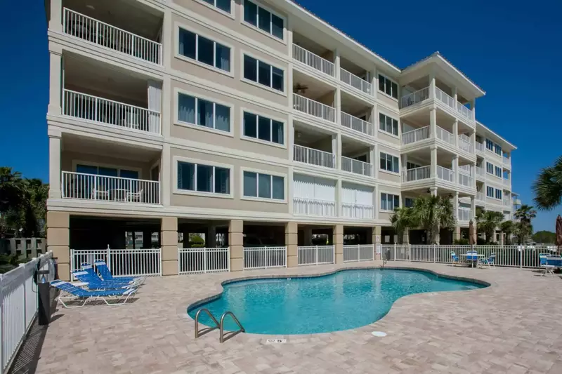 Community pool with lounge and picnic areas