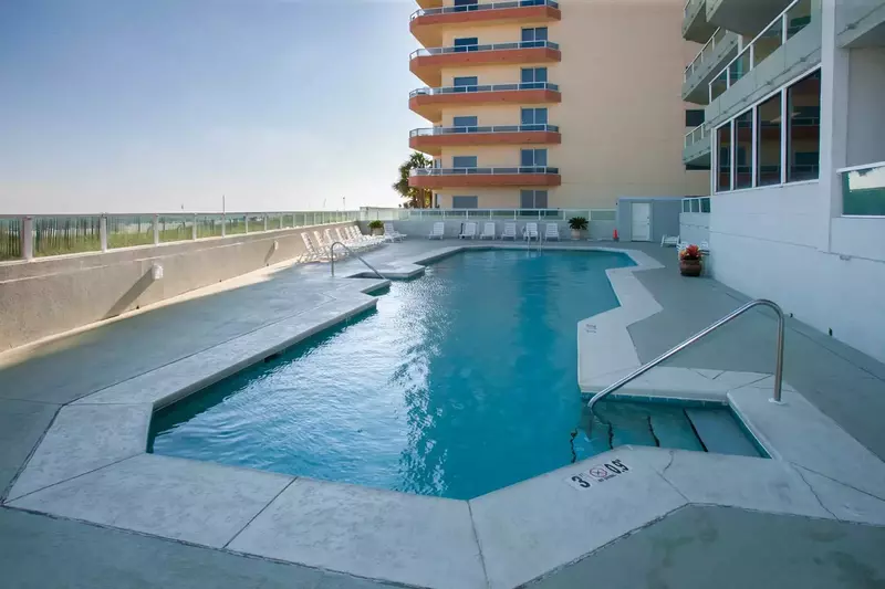 Community pool and lounge chairs