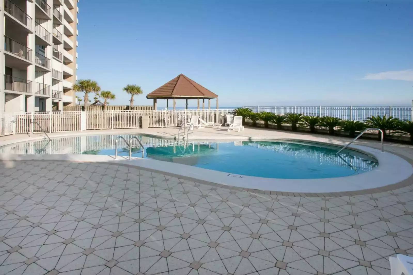 Community pool and view of Gulf