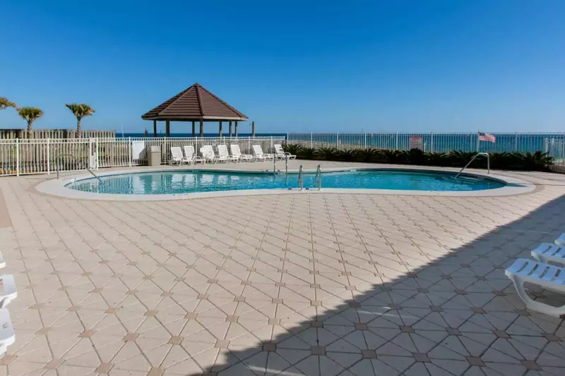 Community pool with background view of Gulf