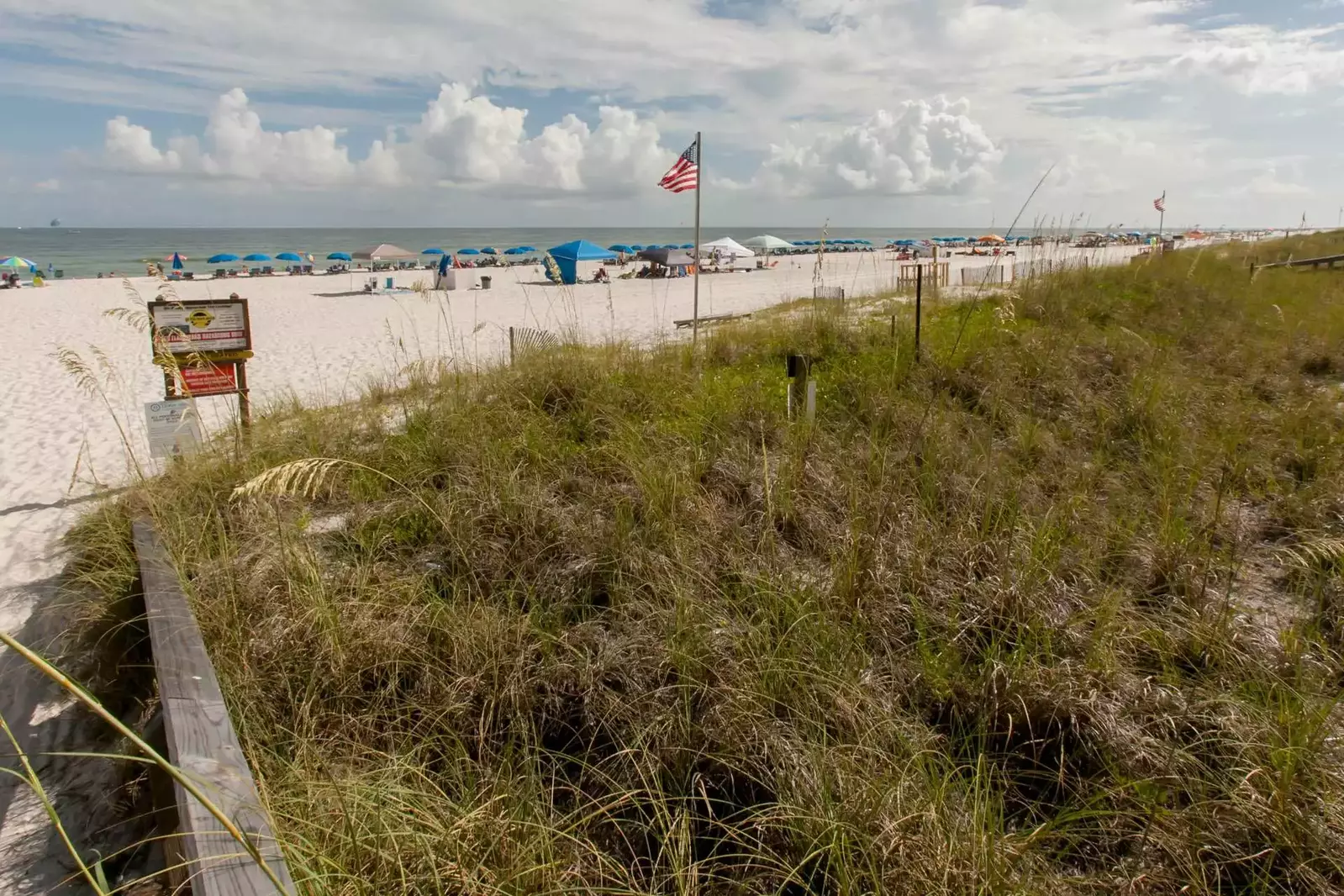 Community boardwalk leading to beach and Gulf