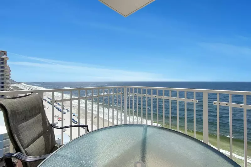 Table dining on the Gulf-front balcony with the sounds of the waves just below!