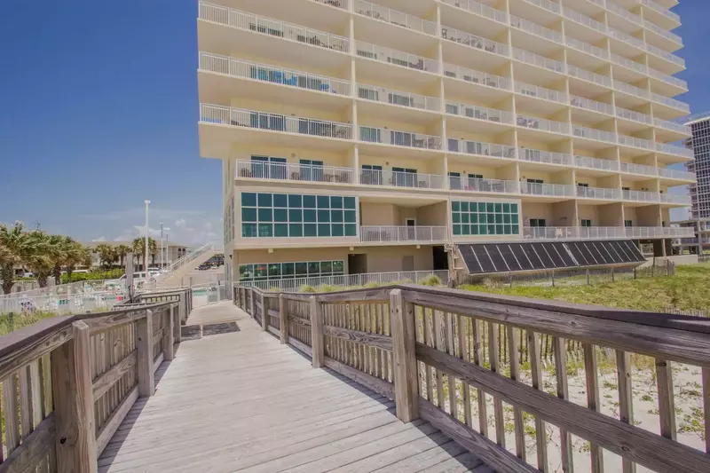 Community boardwalk leading to beach and Gulf