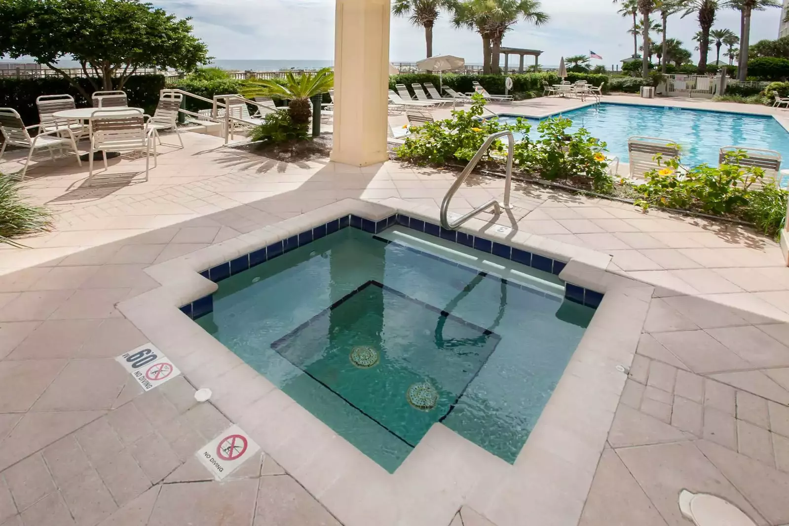 Hot tub overlooking pool
