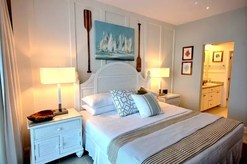 Primary bedroom with two nightstands and two lamps