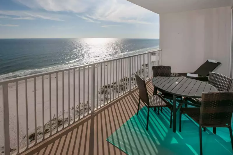 Private balcony with dining and lounging areas