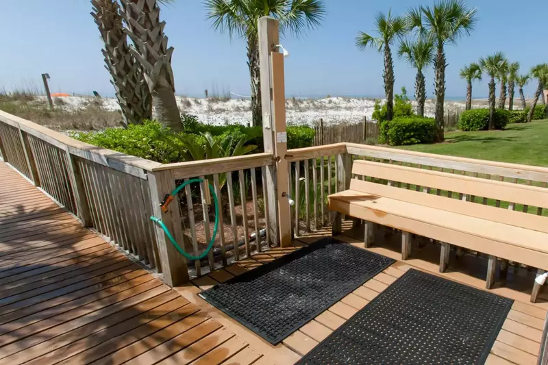 Outside shower on boardwalk to beach