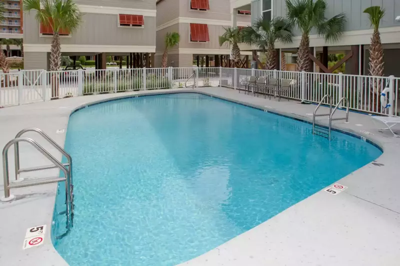 Outdoor pool area just steps from Ashore Thing