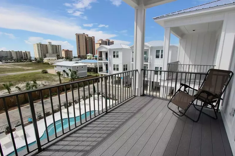 View of beach, pool and community