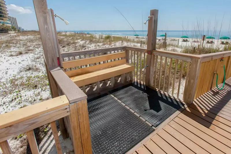 Outside shower on boardwalk to beach
