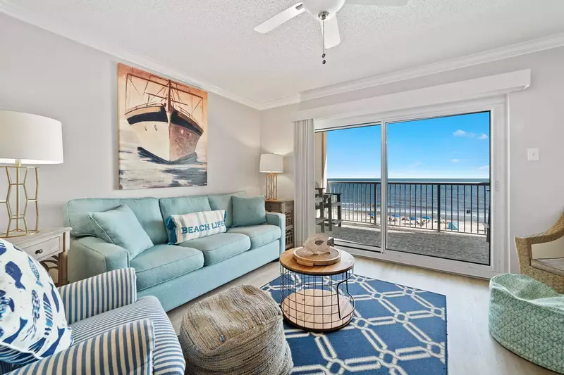 Adorably decorated gulf-front living room with STUNNING views from the 4th floor!