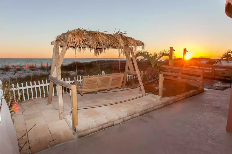 Swing overlooking the dunes and beach
