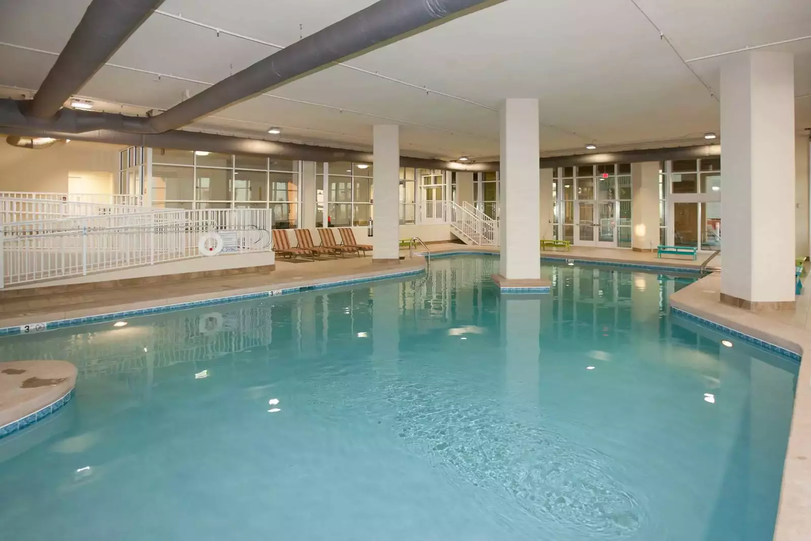 Indoor pool w/lounge chairs