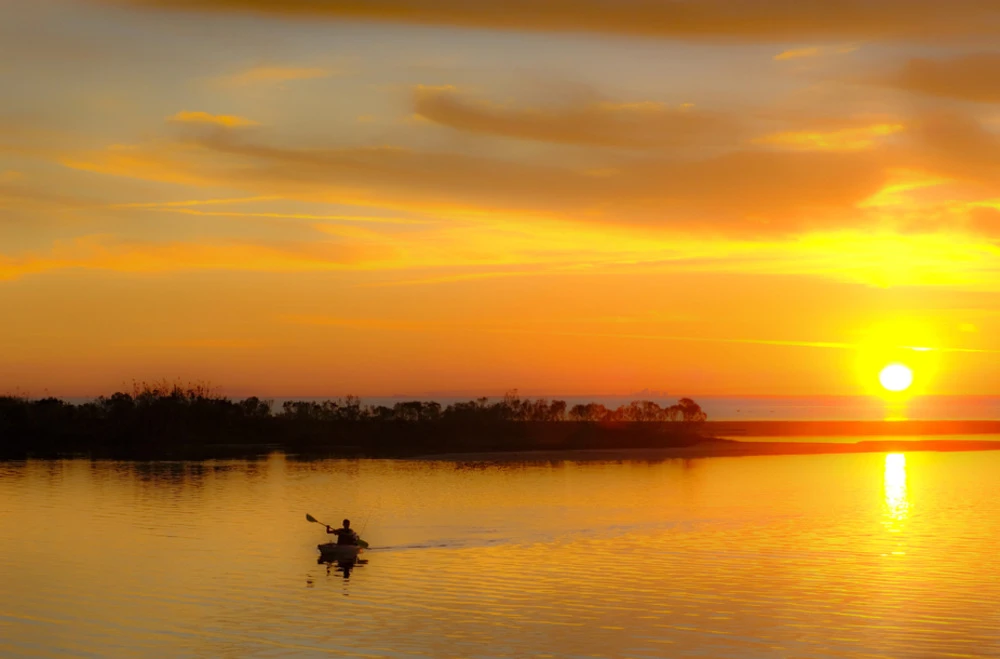 kaying in Gulf Shores AL at sunset